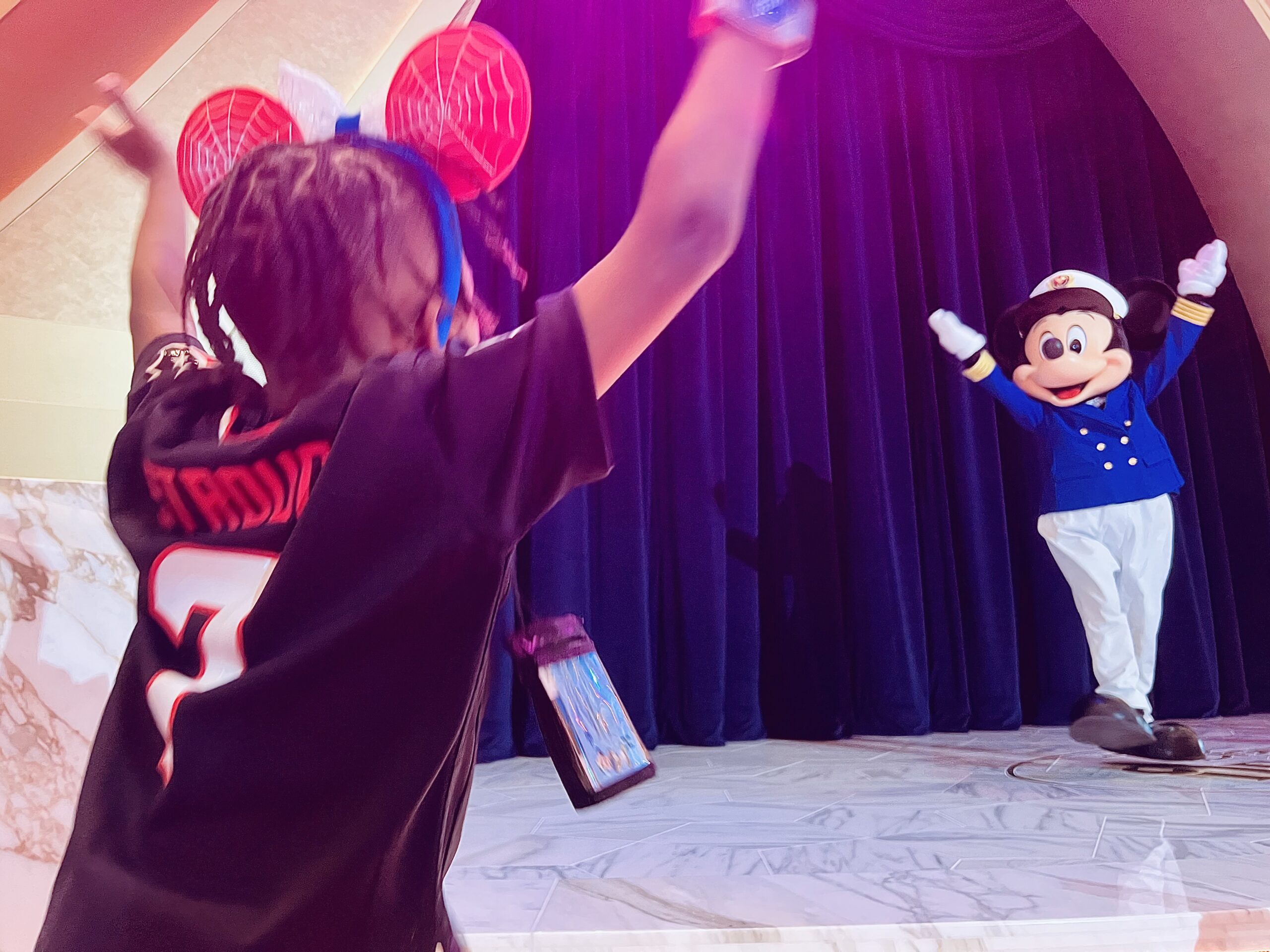 Lennox and Mickey Share a Moment on the Disney Destiny